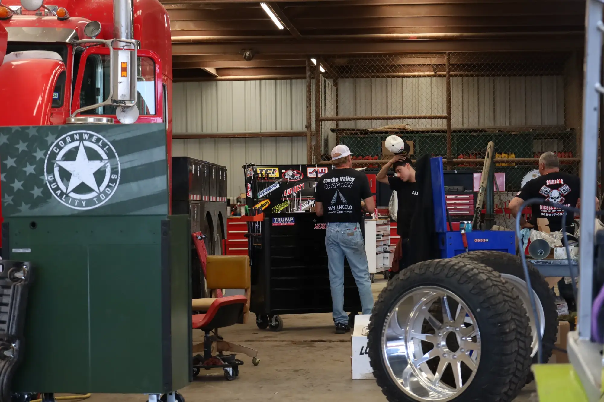 Technicians performing diesel engine repair & truck maintenance in Midland TX workshop