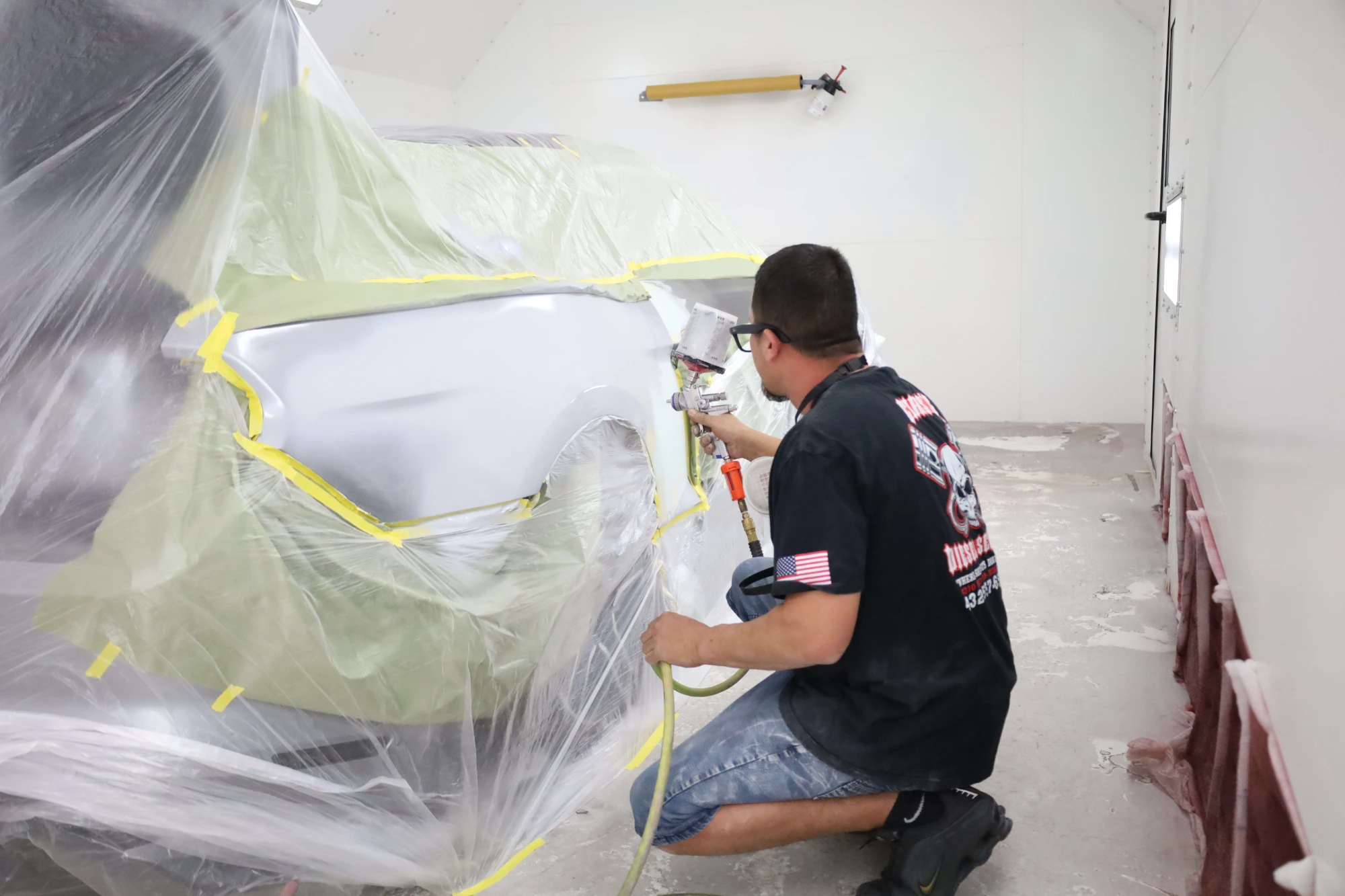 Classic vehicle in primer mid-restoration at Chris's Diesel Service in Midland TX