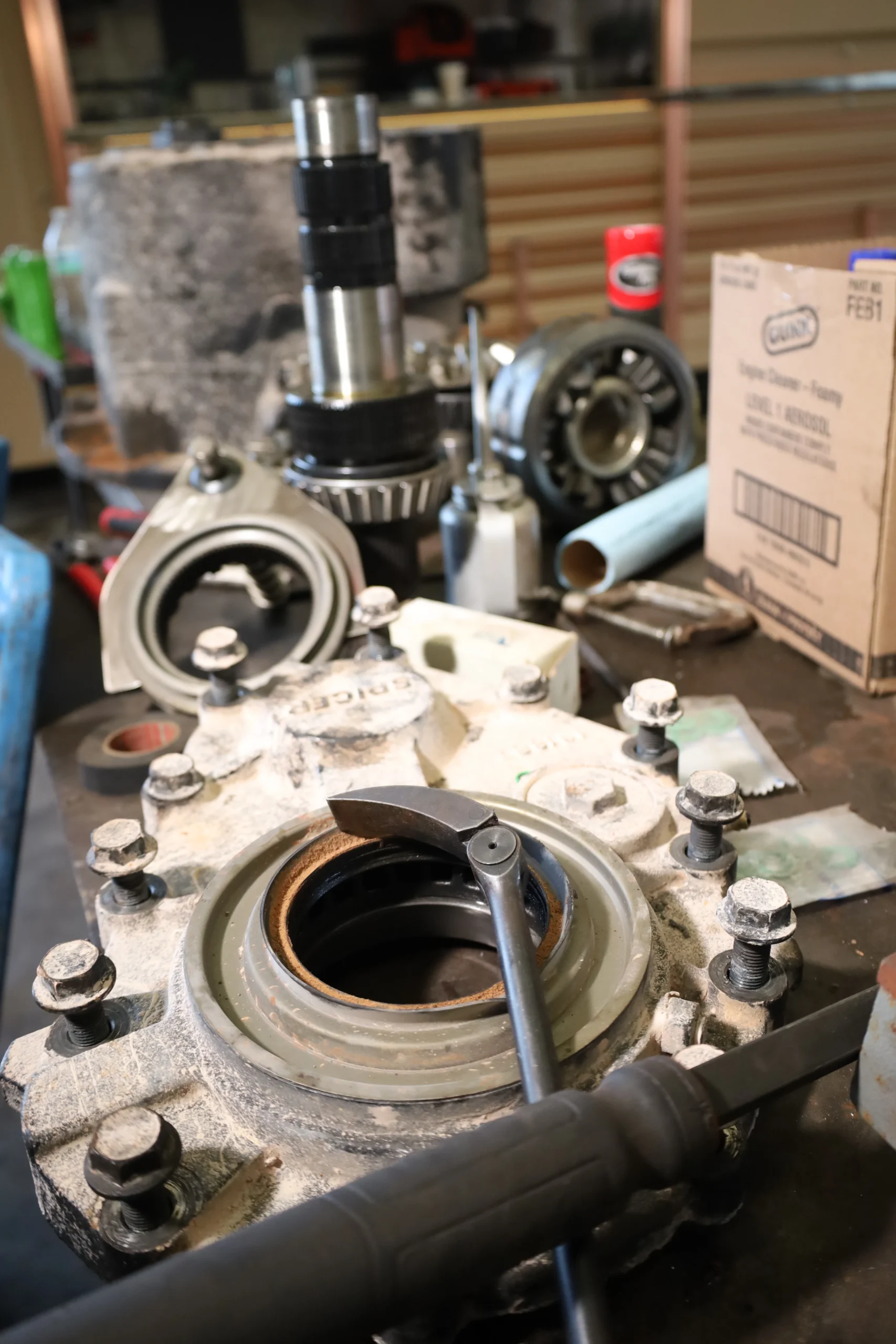 Automatic transmission internal parts prepared for rebuild and inspection in Midland Texas