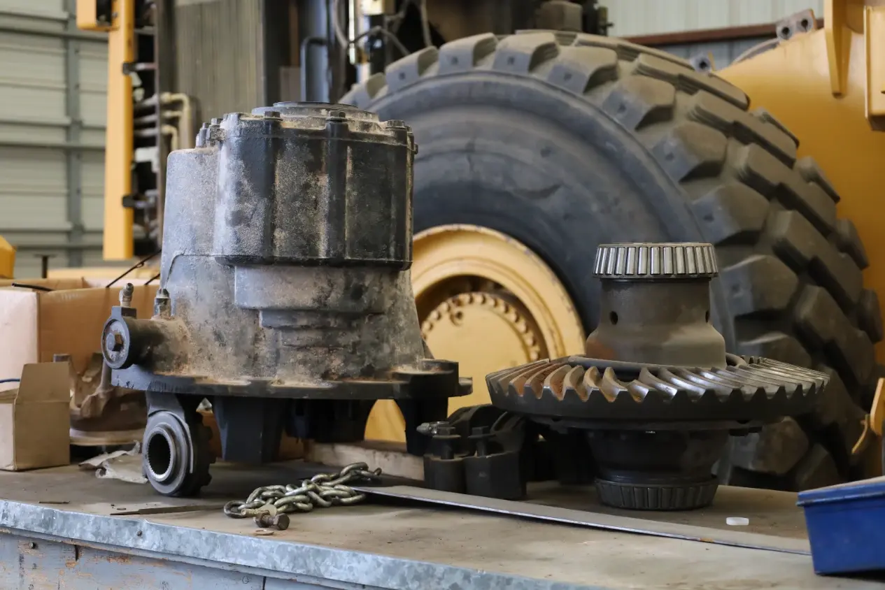 Bulldozer undercarriage repair in the heavy equipment bay at Chris's Diesel Service in Midland TX