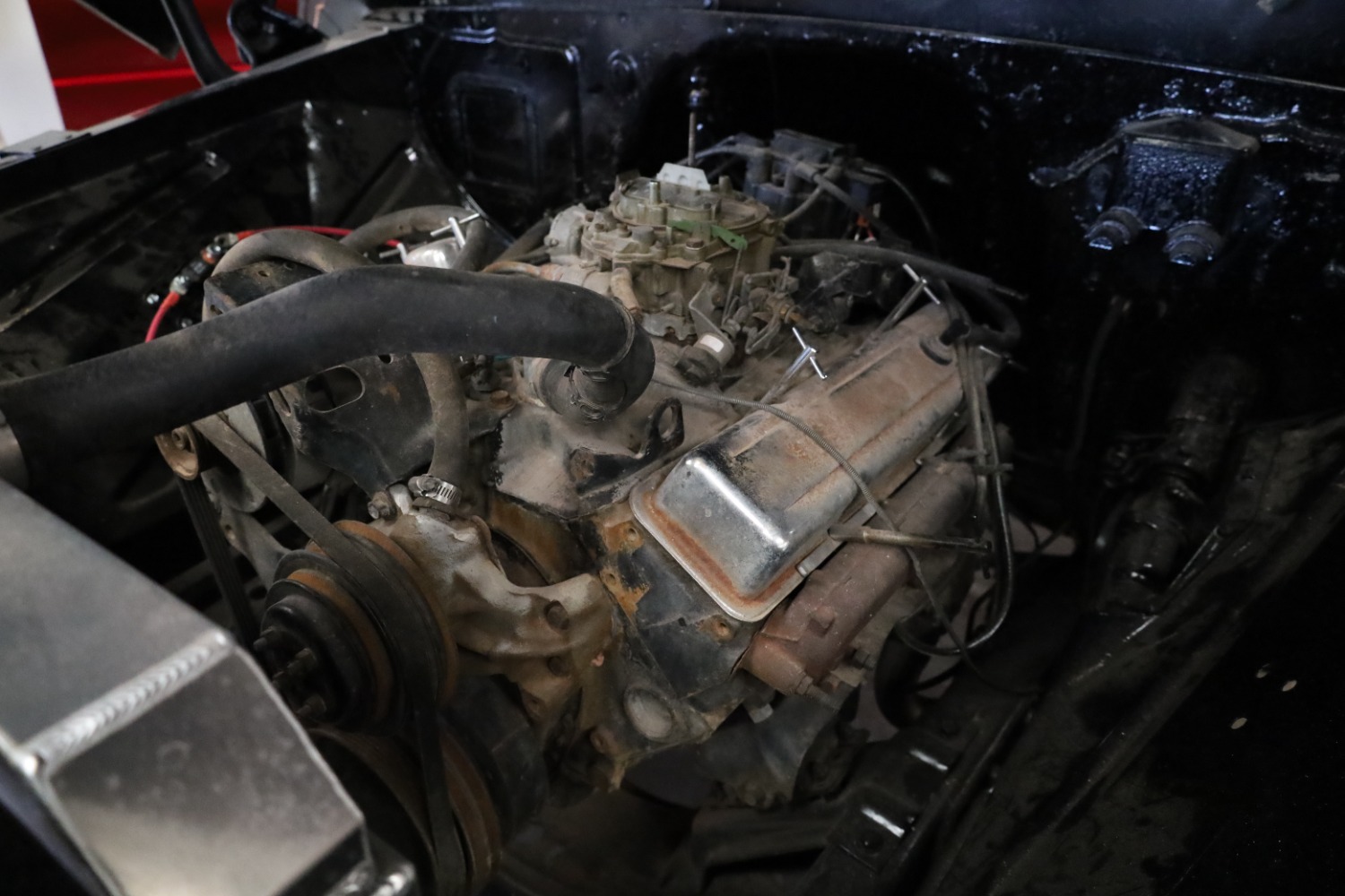 Original V8 engine in a freshly painted classic truck engine bay during restoration in Midland, Texas