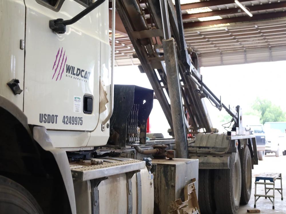 Diesel truck undergoing service and repair at a commercial truck repair shop at Midland Texas