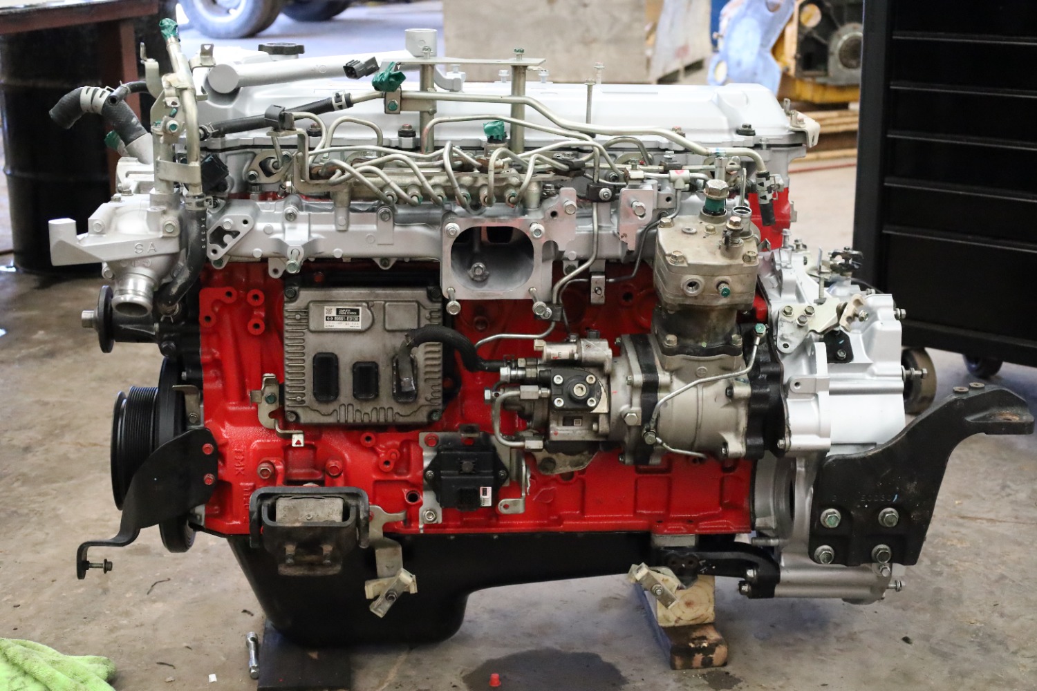 Fully assembled rebuilt diesel engine on the shop floor at Chris's Diesel Service in Midland, Texas